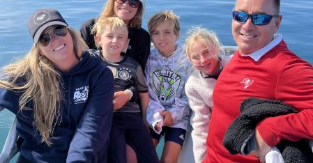 Your Au Pair Contract au pair with her host family on a boat